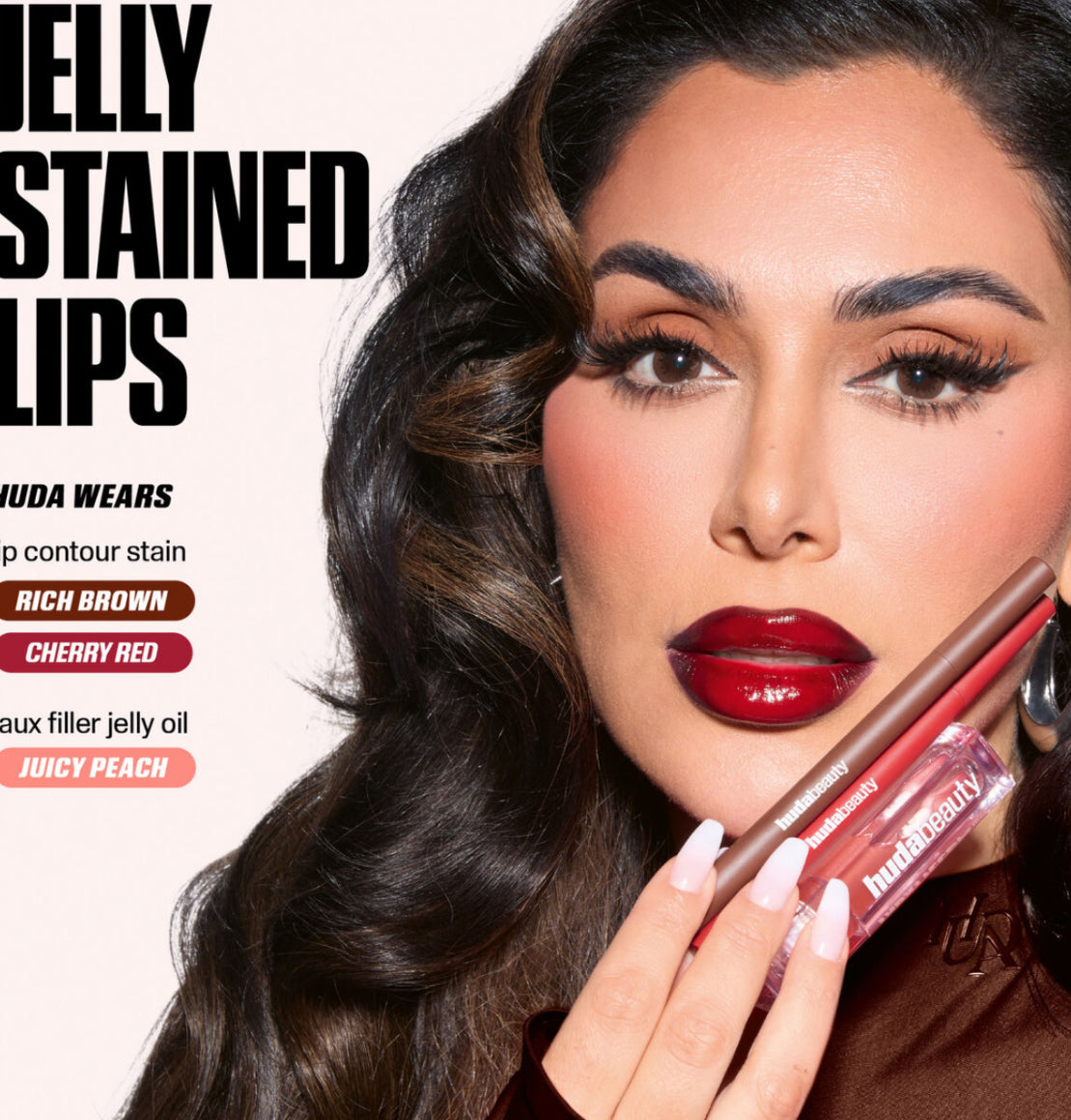 HUDA BEAUTY
Faux Filler Ultra-Hydrating Tinted Jelly Lip Oil