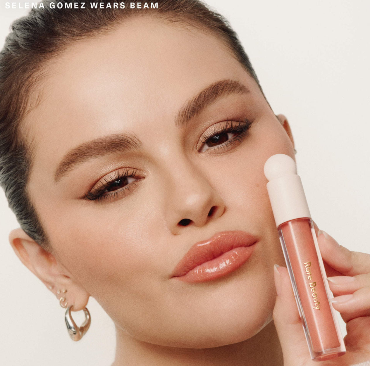Rare Beauty by Selena Gomez
Positive Light Luminizing Lip Gloss
